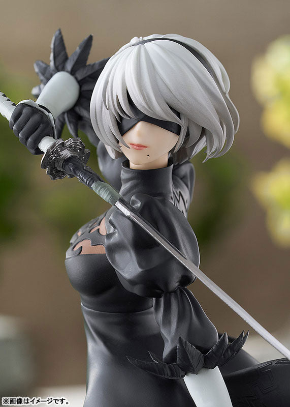 a picture of a toy figure of the character 9S from the video game nier automata from his backside